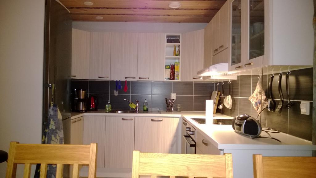 Revontuli Cottage Коларі Номер фото